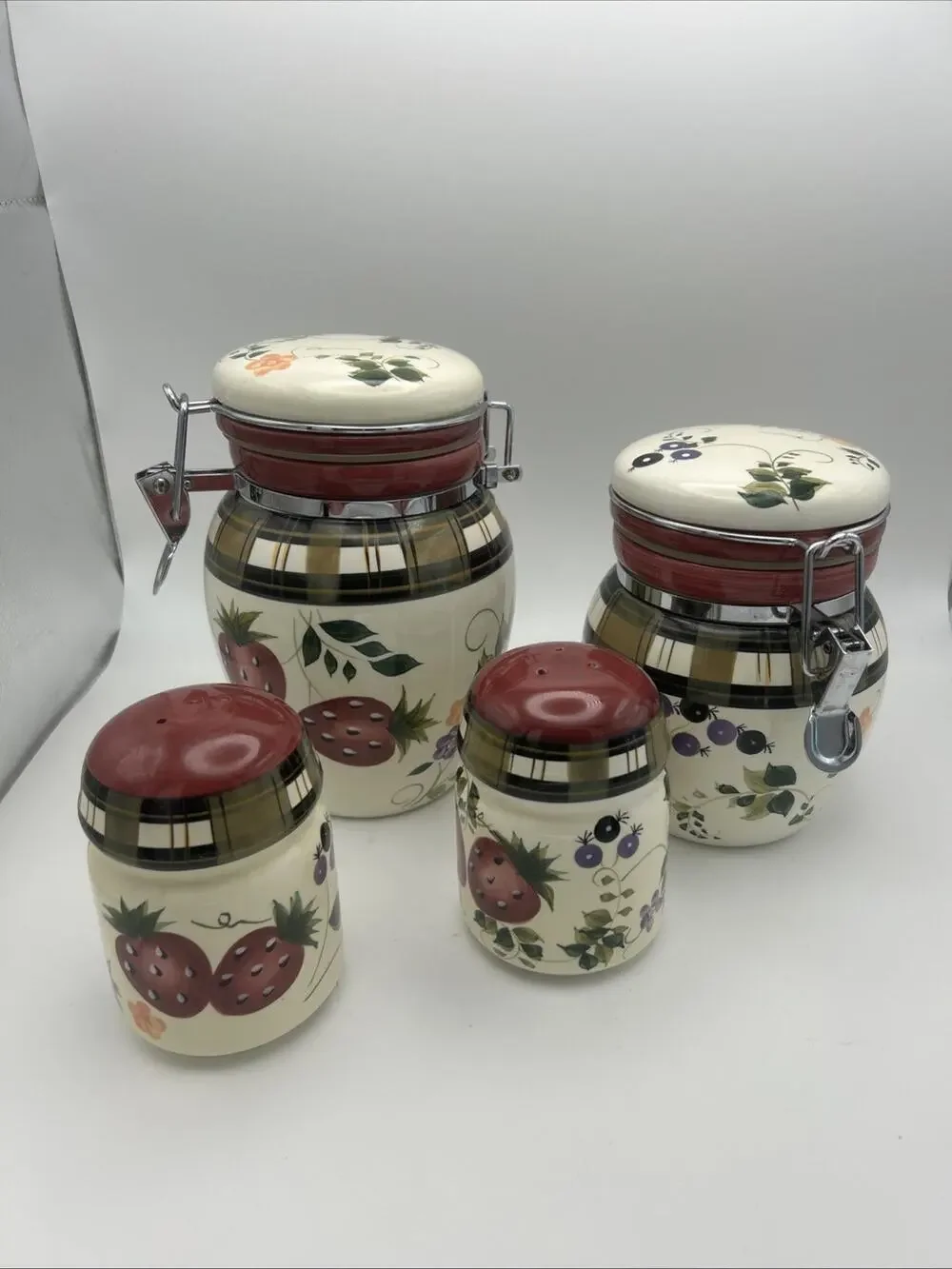 Vintage Oneida. Strawberry Plaid Canisters And Shakers. Discontinued In 2002.